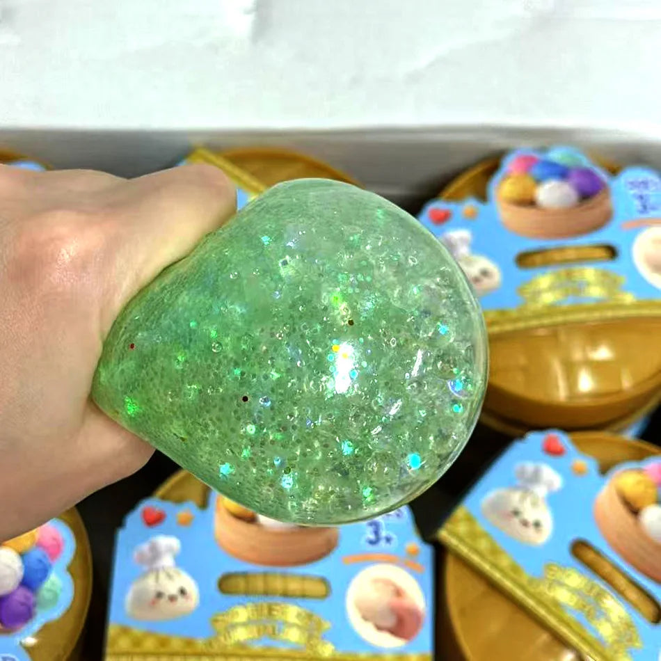1 pc Pick your favorite color or enjoy a fun surprise with a random color! Glitter Dumpling Squishy