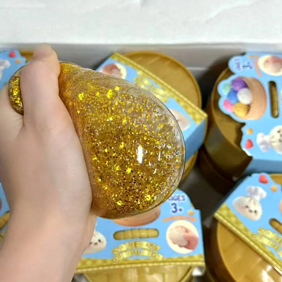 1 pc Pick your favorite color or enjoy a fun surprise with a random color! Glitter Dumpling Squishy