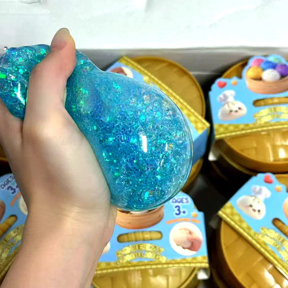 1 pc Pick your favorite color or enjoy a fun surprise with a random color! Glitter Dumpling Squishy